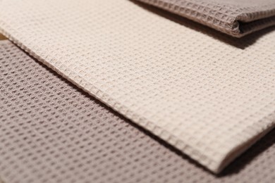 Photo of Clean waffle towels as background, closeup view