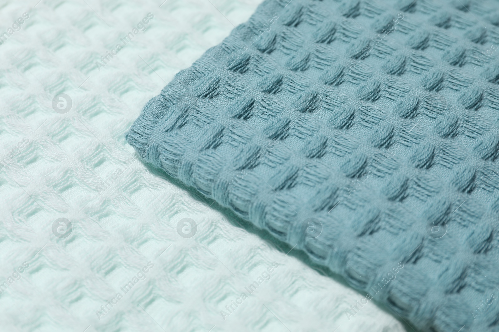 Photo of Clean waffle towels as background, closeup view