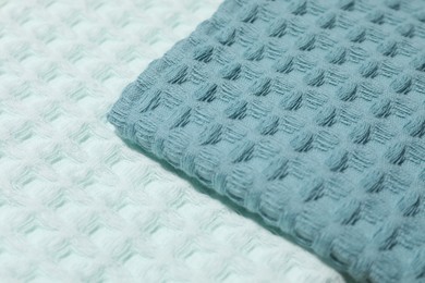 Photo of Clean waffle towels as background, closeup view