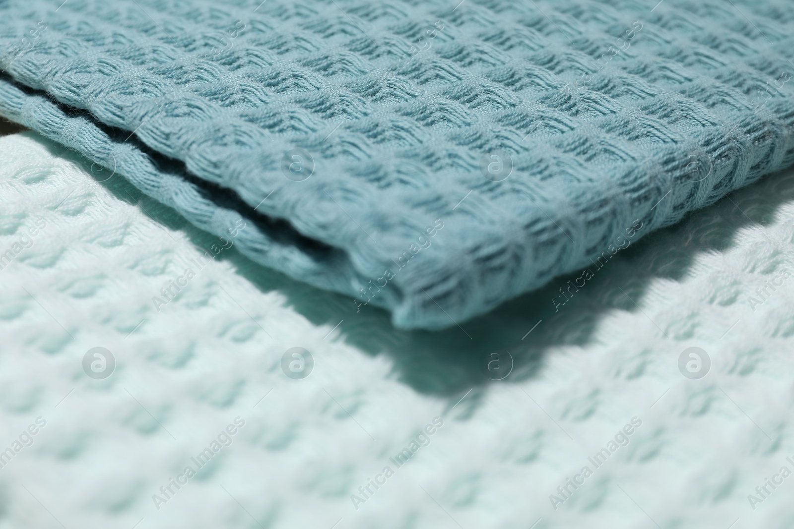 Photo of Clean waffle towels as background, closeup view
