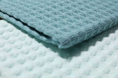 Photo of Clean waffle towels as background, closeup view