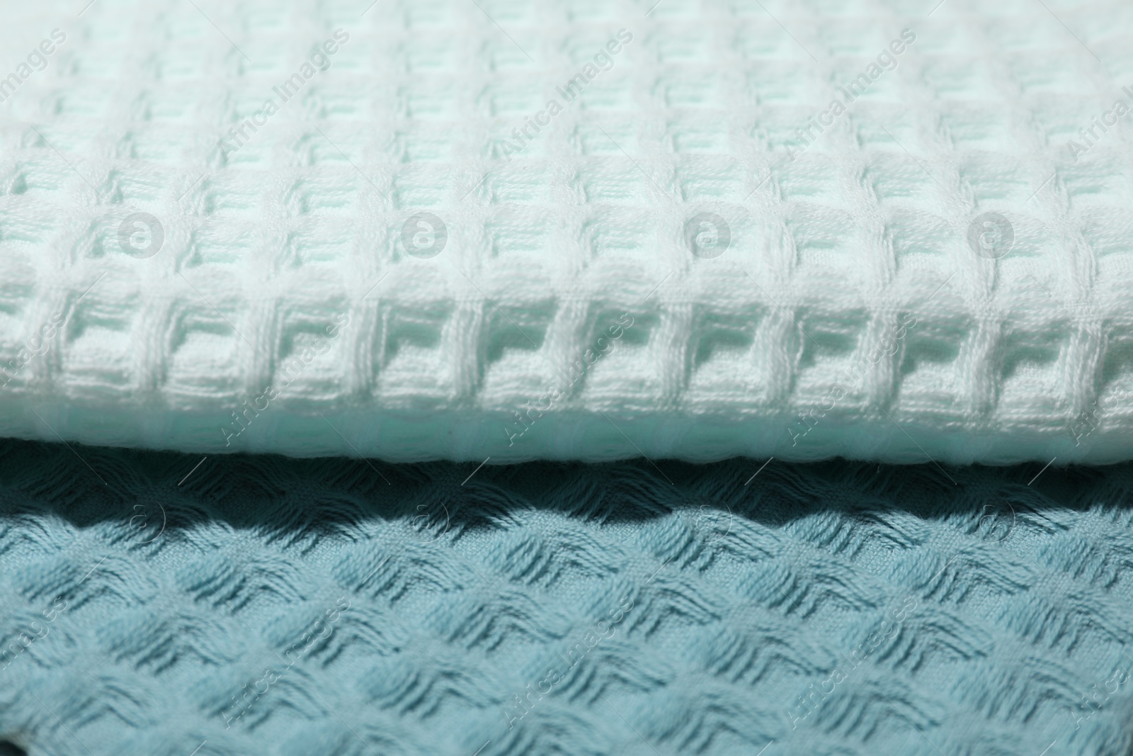 Photo of Clean waffle towels as background, closeup view