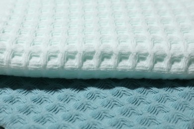 Photo of Clean waffle towels as background, closeup view