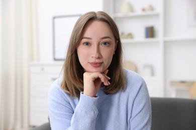 Photo of Portrait of woman at home. Online medical consultation