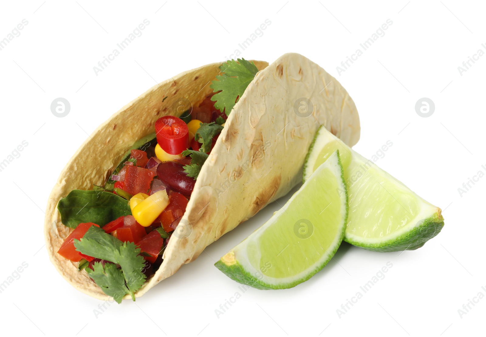 Photo of Tasty vegetarian tacos with beans, vegetables and lime isolated on white