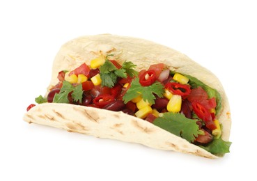 Photo of Tasty vegetarian taco with beans and vegetables isolated on white