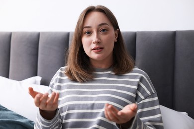 Photo of Portrait of woman at home. Online medical consultation