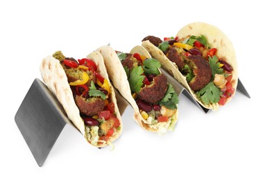 Photo of Tasty vegetarian tacos with falafel, tofu, beans and vegetables isolated on white