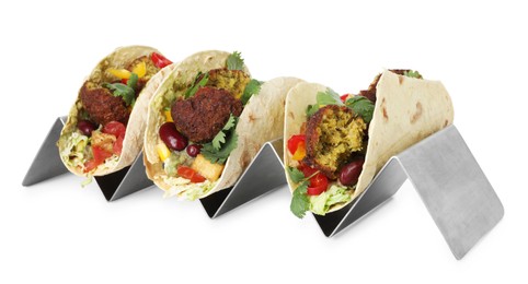 Photo of Tasty vegetarian tacos with falafel, tofu, beans and vegetables isolated on white