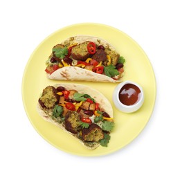 Photo of Tasty vegetarian tacos with falafel, tofu, beans, vegetables and sauce isolated on white, top view