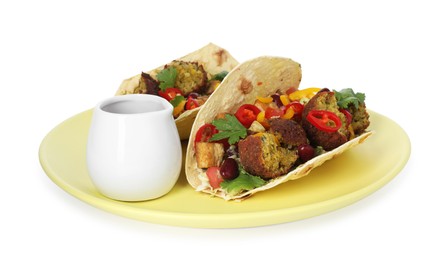 Photo of Tasty vegetarian tacos with falafel, tofu, beans, vegetables and sauce isolated on white