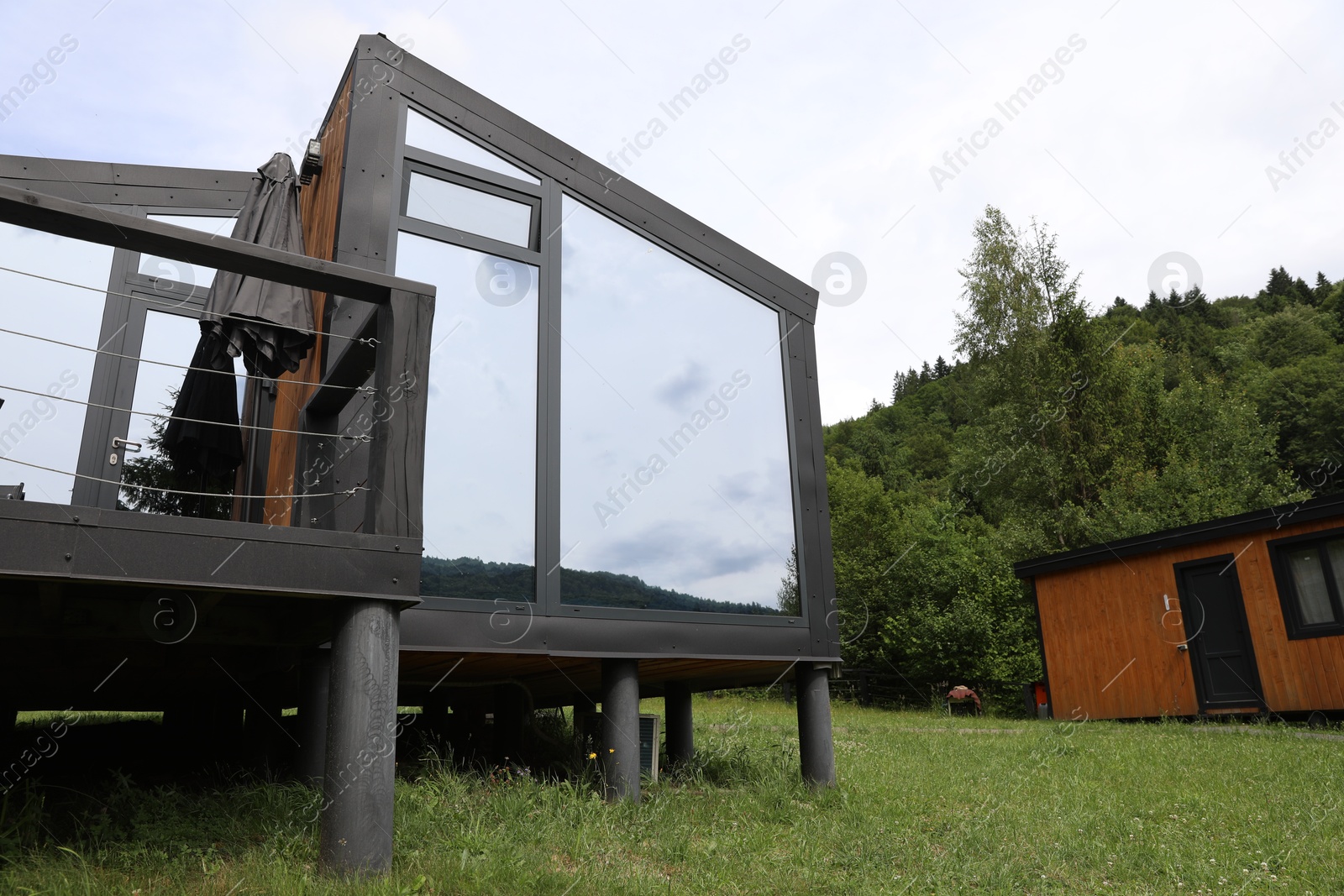Photo of Beautiful buildings at luxury resort in mountains, low angle view