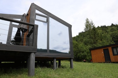 Photo of Beautiful buildings at luxury resort in mountains, low angle view