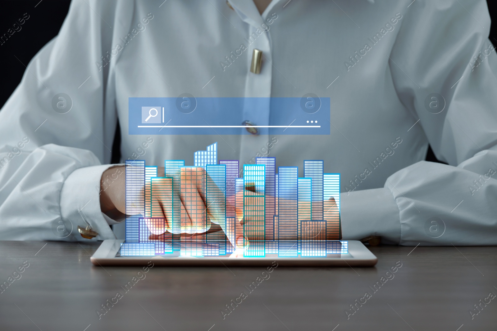 Image of Searching for housing online. Real estate agent using tablet computer at table, closeup. Search bar with buildings above device