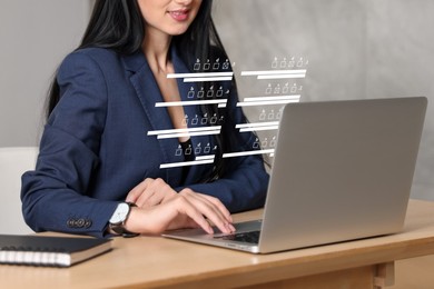 Image of Woman passing online test on laptop at table, closeup. Virtual form above computer