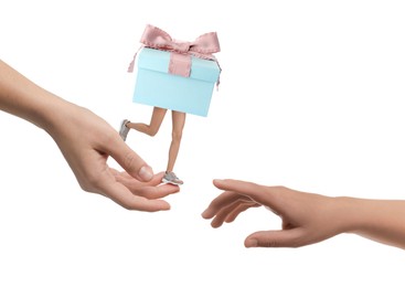 Image of Gift box with woman's legs running from one hand to another on white background. Fast delivery