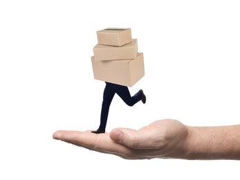 Image of Cardboard boxes with man's legs running on hand against white background. Fast delivery