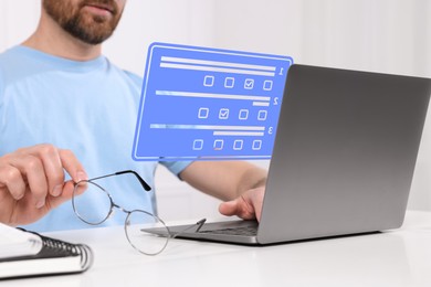 Image of Man passing online test on laptop at table, closeup. Virtual form above computer