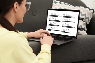 Image of Woman passing online test on laptop at home, closeup