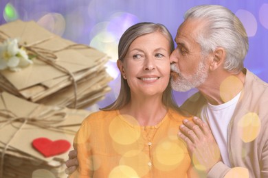 Image of Romantic senior couple and love letters, bokeh effect. Man kissing his beloved woman against violet background