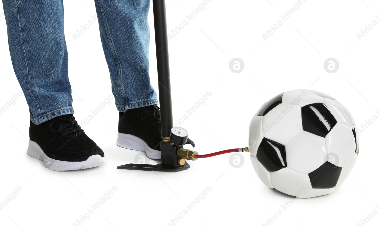 Photo of Man inflating soccer ball with manual air pump on white background, closeup