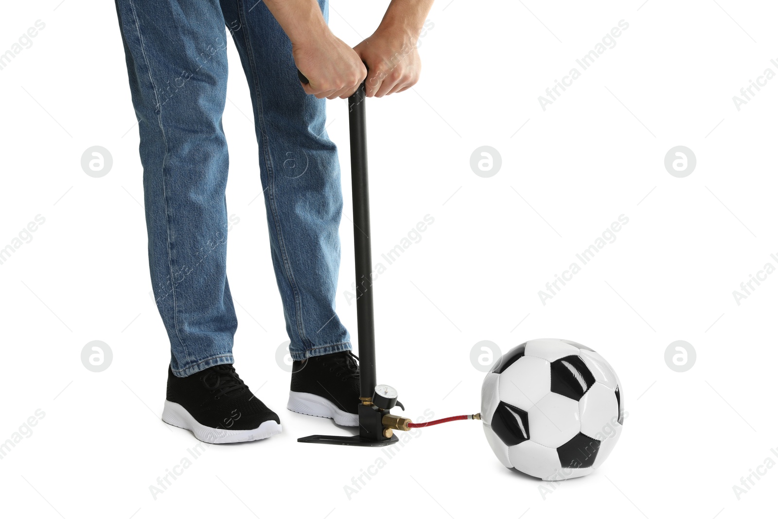 Photo of Man inflating soccer ball with manual air pump on white background, closeup