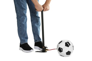 Photo of Man inflating soccer ball with manual air pump on white background, closeup