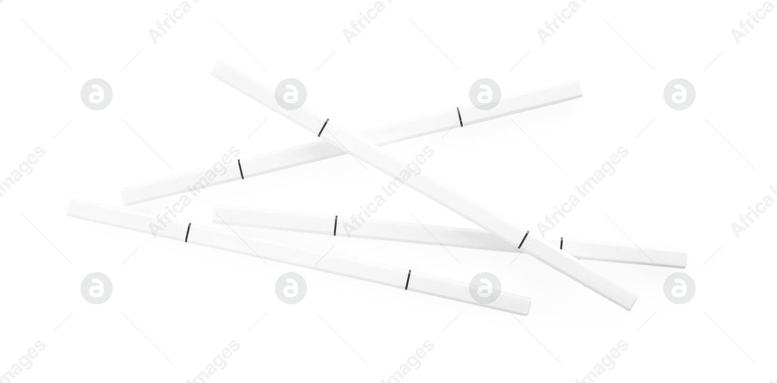 Photo of Many twist up eyebrow pencils isolated on white, top view