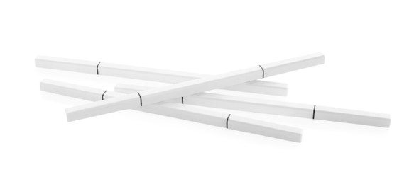 Photo of Many twist up eyebrow pencils isolated on white