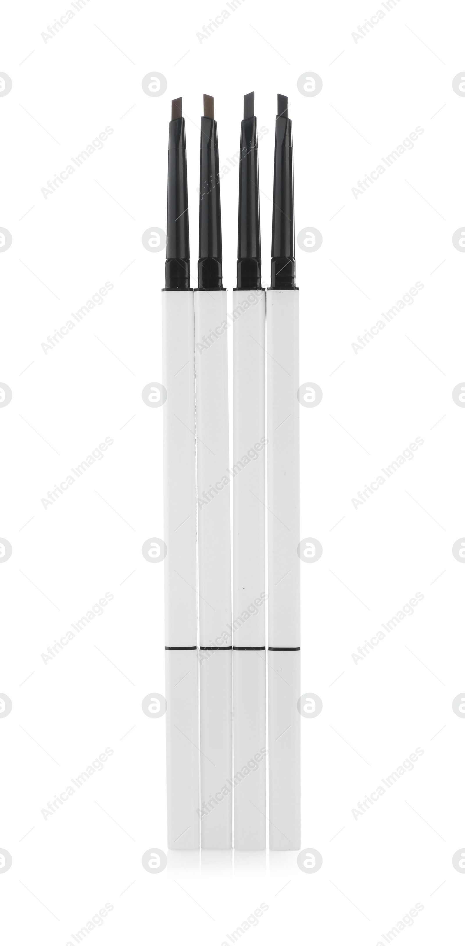 Photo of Many twist up eyebrow pencils isolated on white, top view