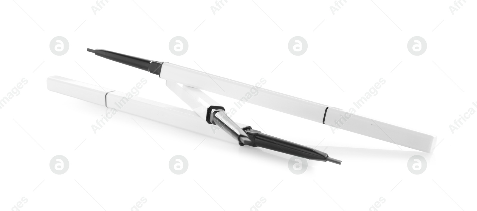 Photo of Two twist up eyebrow pencils isolated on white