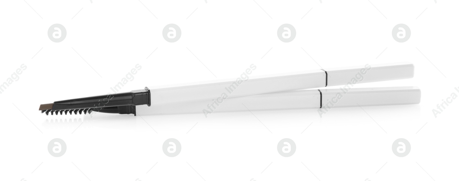 Photo of Two twist up eyebrow pencils isolated on white