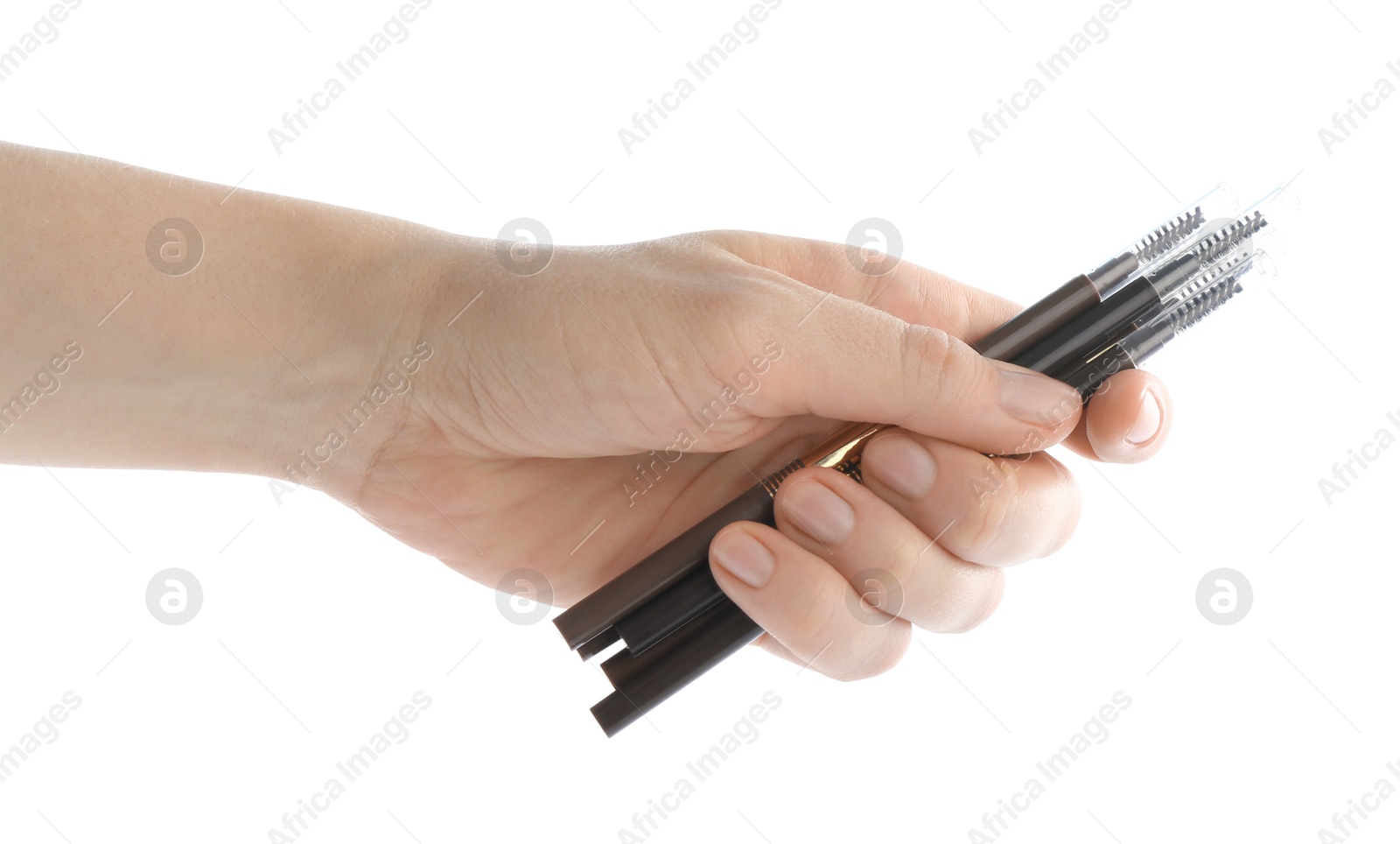Photo of Woman with eyebrow pencils on white background, closeup