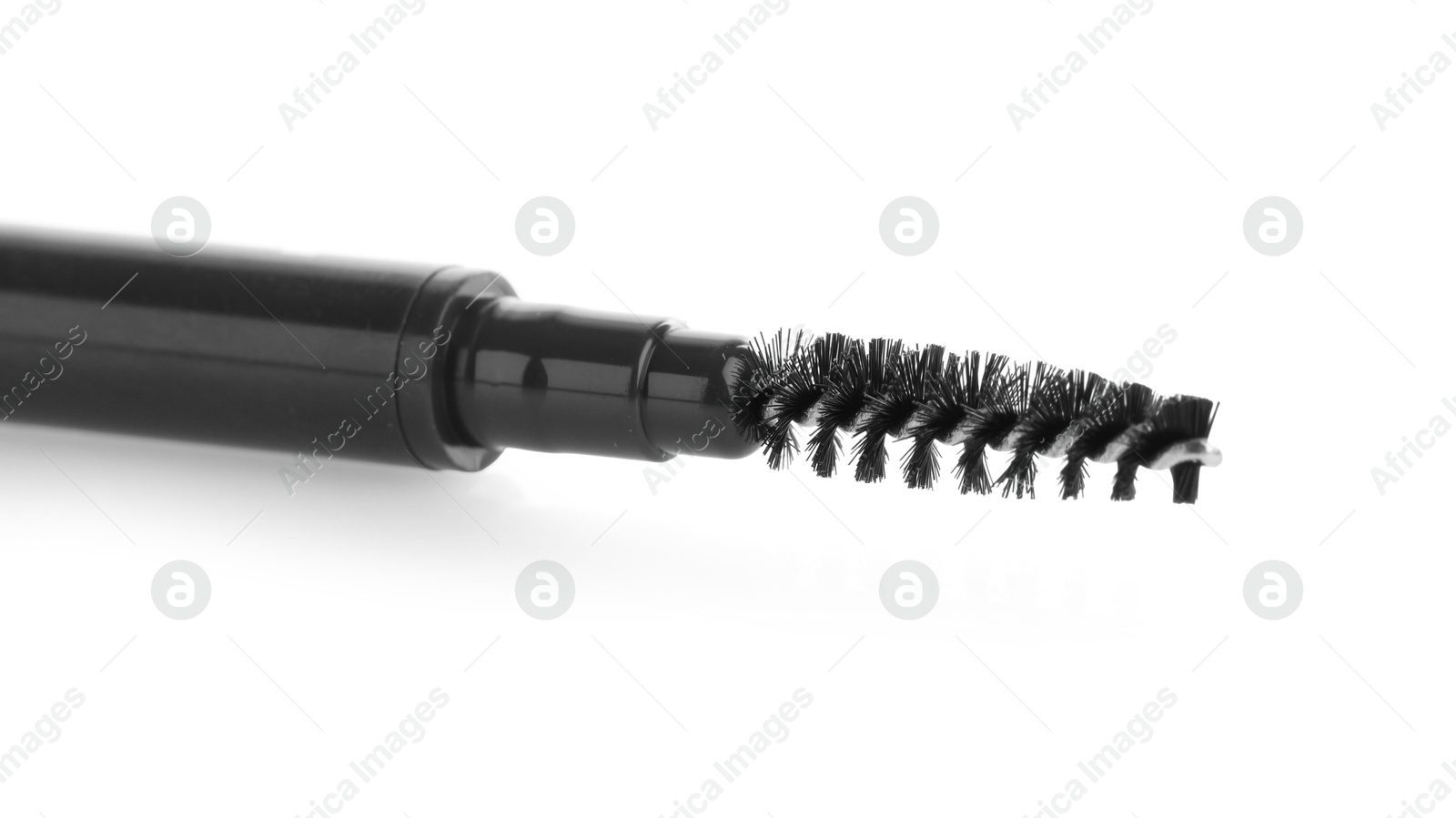 One eyebrow pencil with brush isolated on white Photo of One eyebrow pencil with brush isolated on white
