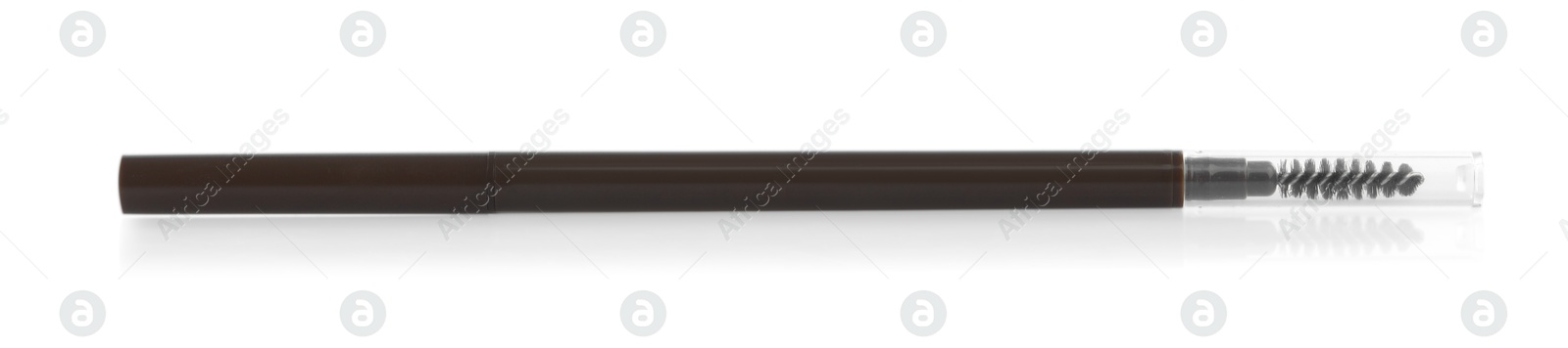 One brown twist up eyebrow pencil with brush isolated on white Photo of One brown twist up eyebrow pencil with brush isolated on white