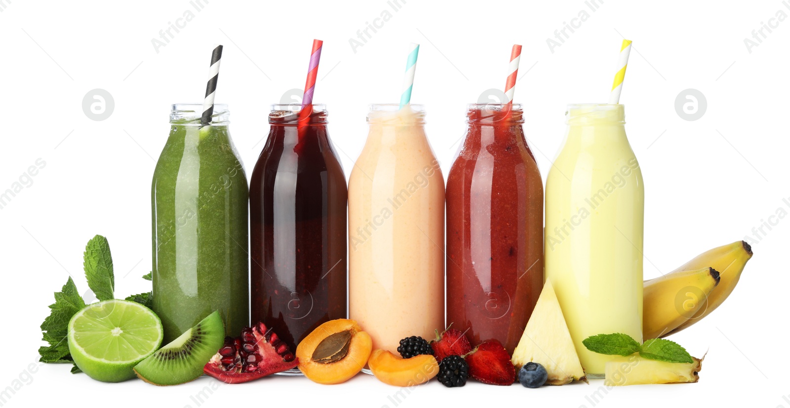 Superfood. Tasty smoothies in glass bottles and ingredients isolated on white Photo of Superfood. Tasty smoothies in glass bottles and ingredients isolated on white
