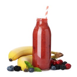 Photo of Superfood. Tasty smoothie in glass bottle and ingredients isolated on white