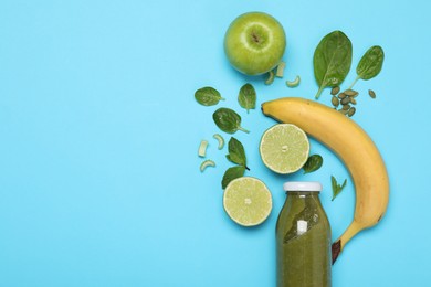 Photo of Superfood. Tasty smoothie in glass bottle and ingredients on light blue background, flat lay. Space for text