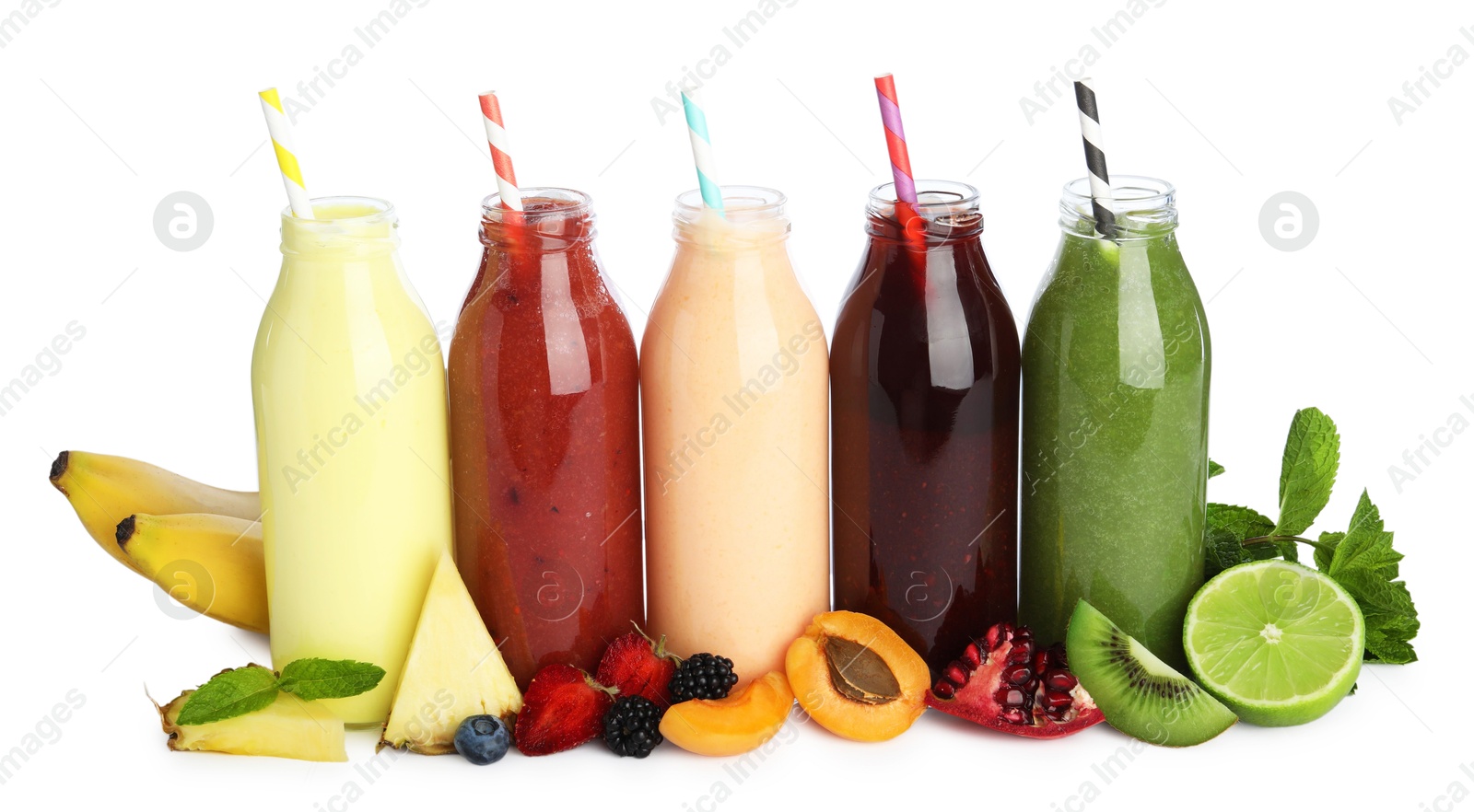 Superfood. Tasty smoothies in glass bottles and ingredients isolated on white Photo of Superfood. Tasty smoothies in glass bottles and ingredients isolated on white