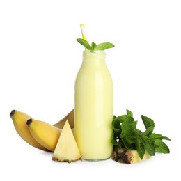Photo of Superfood. Tasty smoothie in glass bottle and ingredients isolated on white