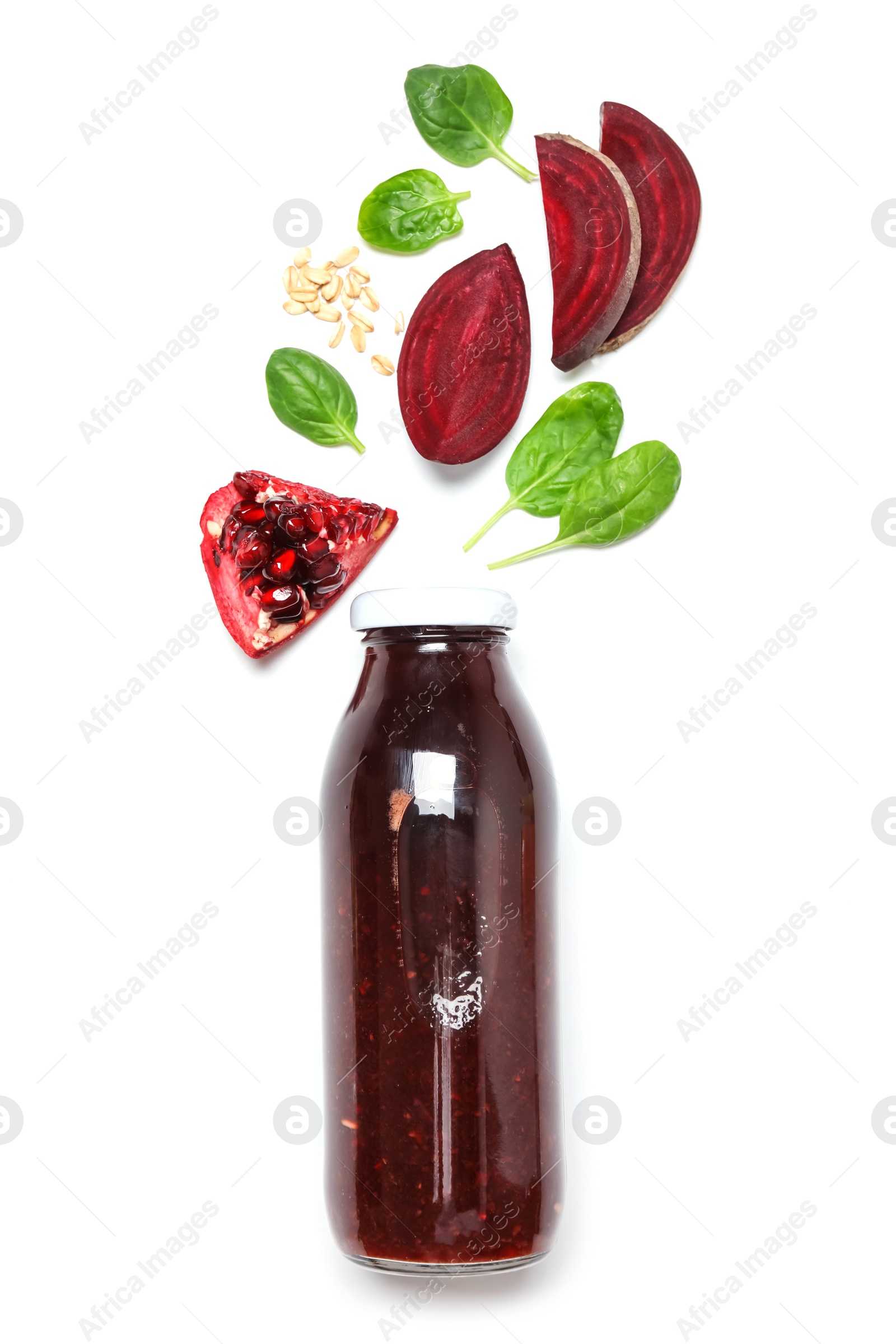 Superfood. Tasty smoothie in glass bottle and ingredients isolated on white, top view Photo of Superfood. Tasty smoothie in glass bottle and ingredients isolated on white, top view