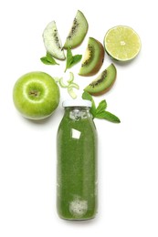 Photo of Superfood. Tasty smoothie in glass bottle and ingredients isolated on white, top view
