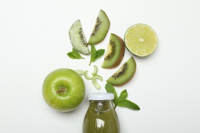 Photo of Superfood. Tasty smoothie in glass bottle and ingredients on white background, top view