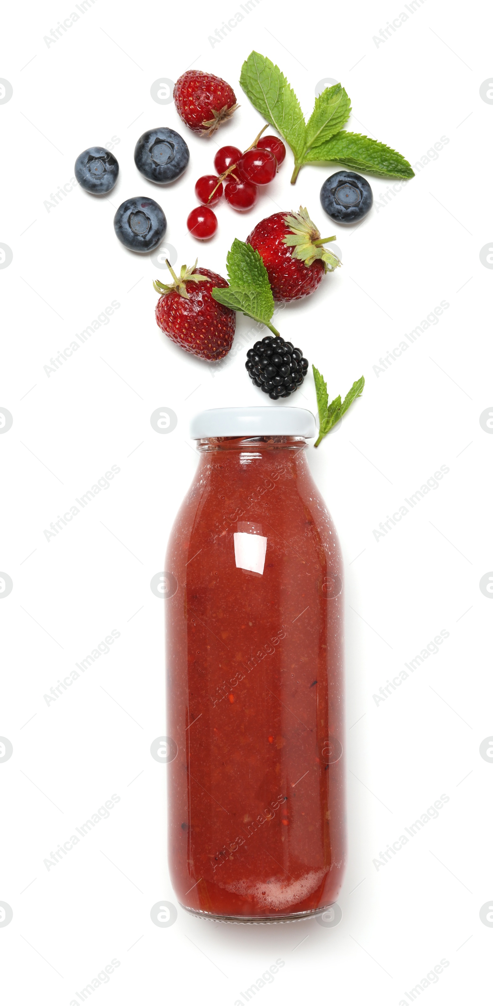Superfood. Tasty smoothie in glass bottle and ingredients isolated on white, top view Photo of Superfood. Tasty smoothie in glass bottle and ingredients isolated on white, top view
