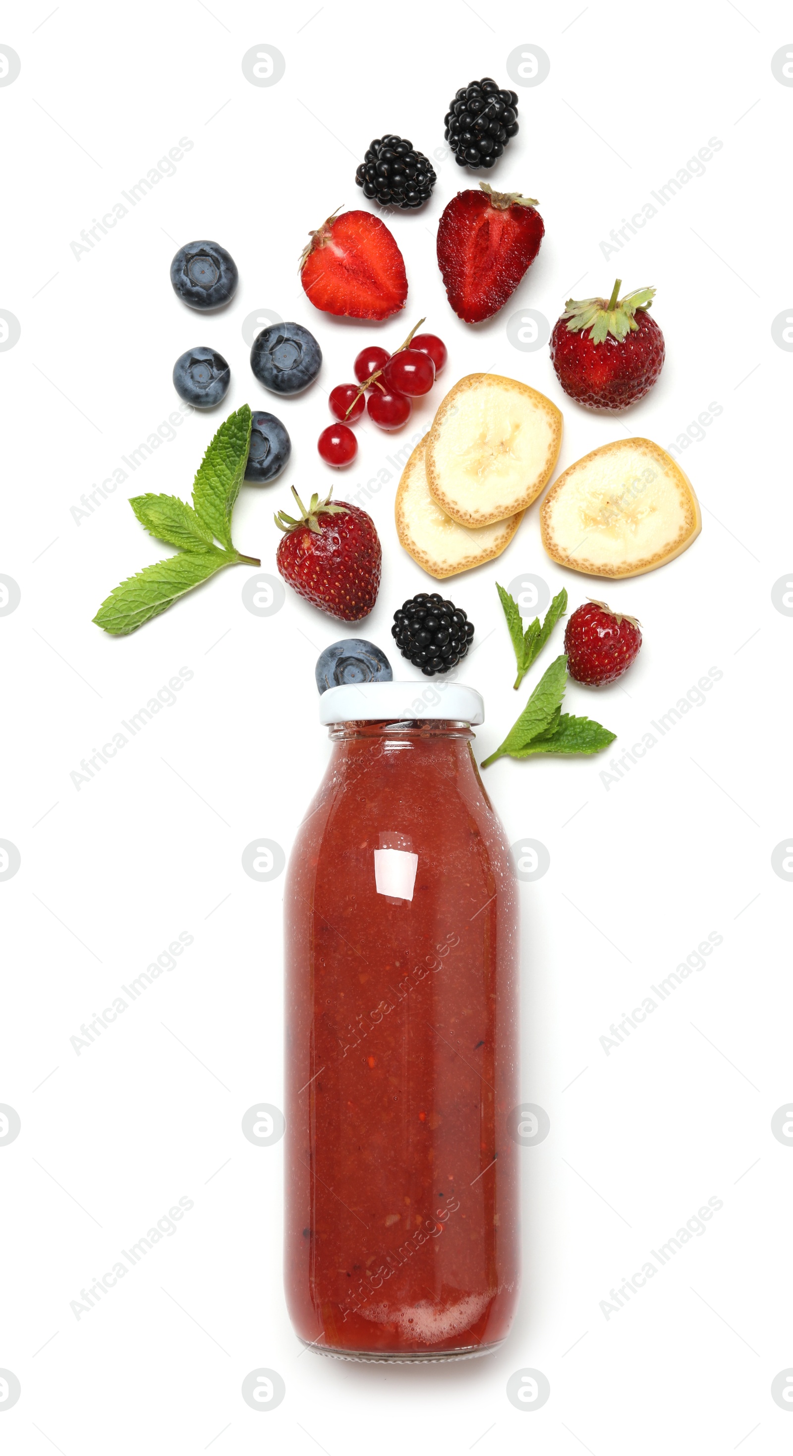 Superfood. Tasty smoothie in glass bottle and ingredients isolated on white, top view Photo of Superfood. Tasty smoothie in glass bottle and ingredients isolated on white, top view