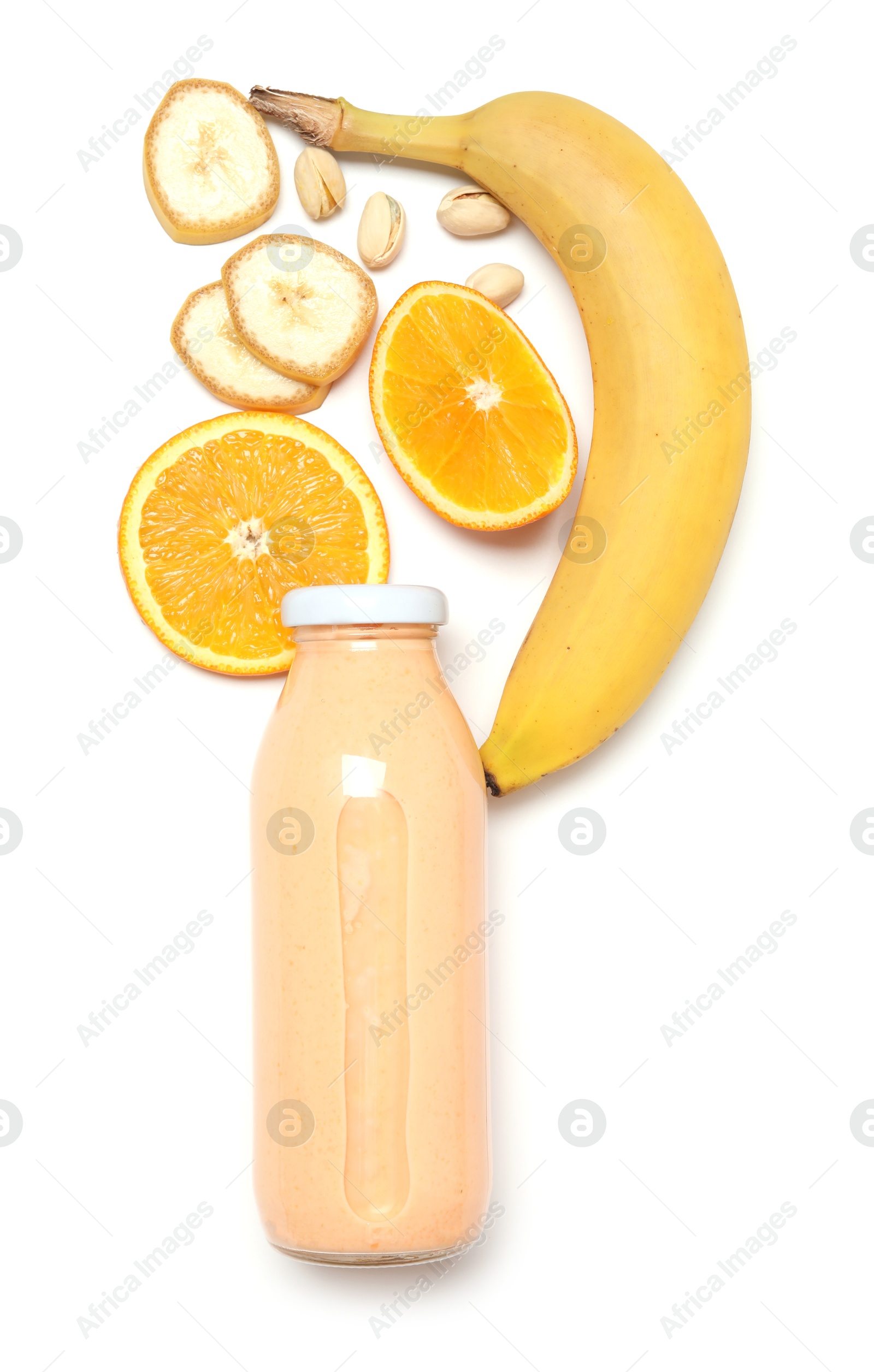Photo of Superfood. Tasty smoothie in glass bottle and ingredients isolated on white, top view