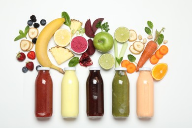 Photo of Superfood. Tasty smoothie in glass bottle and ingredients on white background, top view