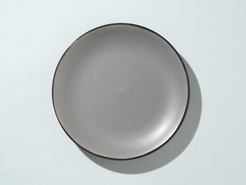 Photo of One stylish plate on white background, top view