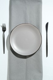 Photo of Stylish plate, cutlery and runner on white background, flat lay