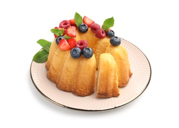 Photo of Tasty Bundt cake with berries and mint isolated on white